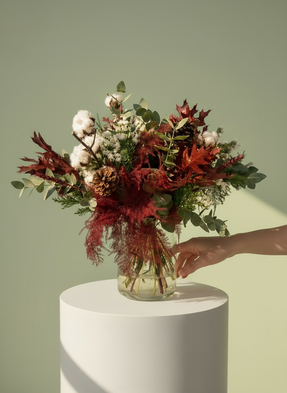 Ramo con detalle navideños ideal para decorar un centro de mesa